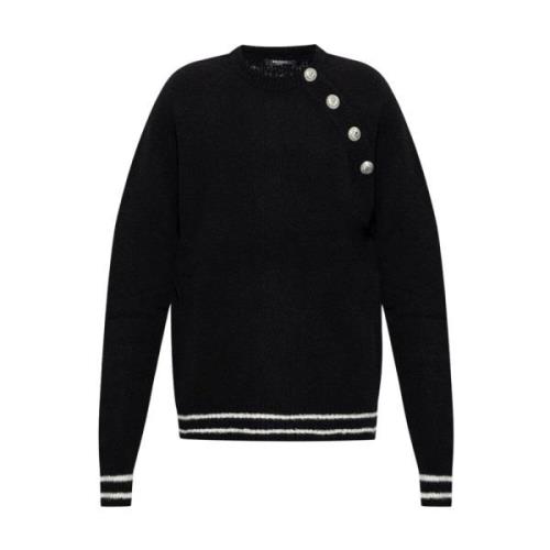 Sweater med dekorativ lukning