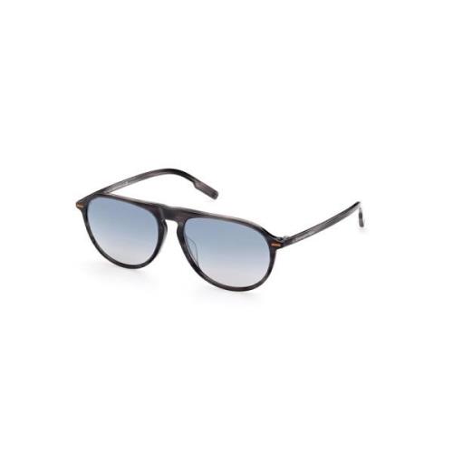 Stilfulde solbriller med blå spejllinser