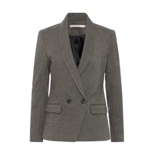 Moderne ternet blazer med eksklusive knapper